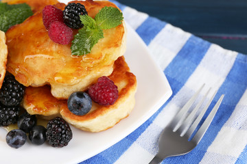 Tasty pancake with fresh berries and mint leaf