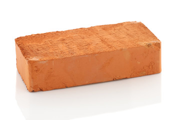 single red brick isolated on white background