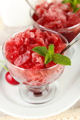 Closeup of cherry granita in glass bowls,