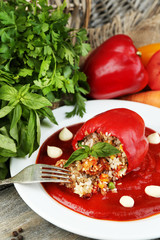 Prepared stuffed pepper with tomato sauce