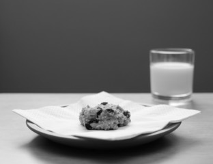 Oatmeal raisin cookie with a glass of milk