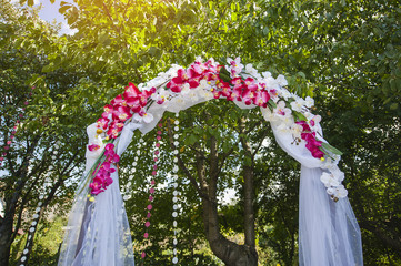 Arch for the wedding ceremony. Floristic composition in vintage