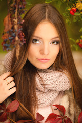 Portrait girl relaxing walking in autumnal park.