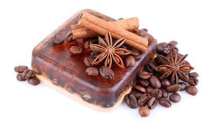 Organic soap with coffee beans and spices, isolated on white
