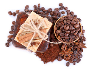Organic soap with coffee beans and spices, isolated on white