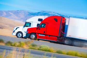 Two Speeding Semi Trucks © Tomasz Zajda