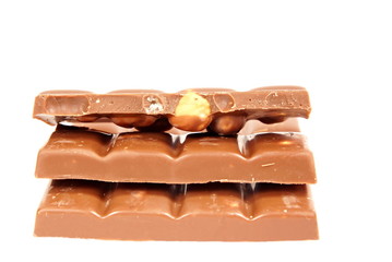 Broken blocks milk chocolate with hazelnuts