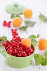 Fresh red currant and apricots