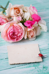 Postcard with elegant  flowers and empty tag for your text