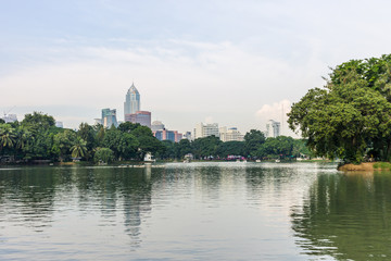 Modern building with lake in the park