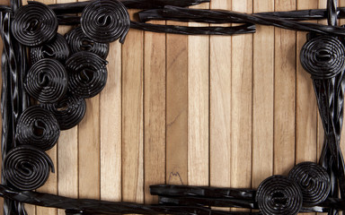 Wooden background with licorice