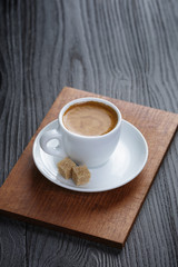 classic double espresso on wood table