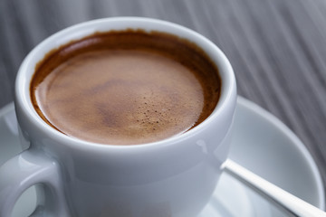 classic double espresso on wood table