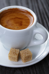 classic double espresso on wood table