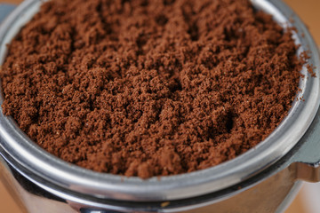 ground coffee in portafilter