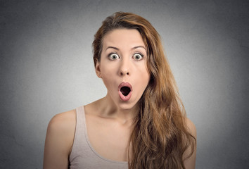 Surprise astonished woman with wide open eyes and mouth