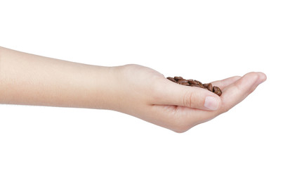 female teen hand hold coffee beans