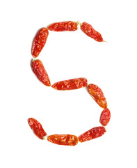 Alphabet letter S arranged from chili peppers isolated