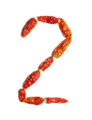 Number 2 arranged from chili peppers isolated