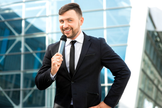 Portrait of well-dressed man on the contempopary background