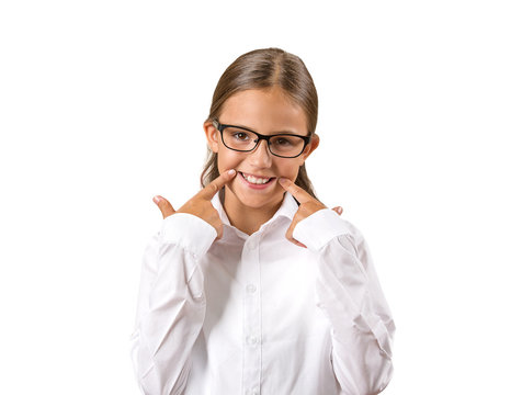 girl with glasses making fake smiling face expression