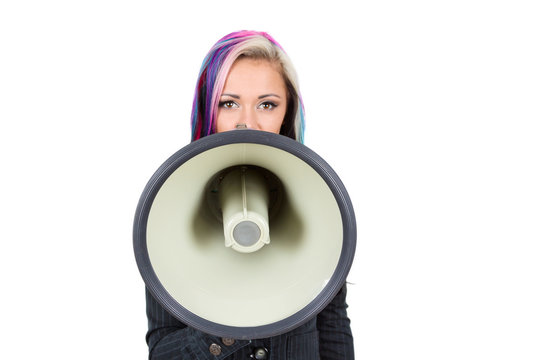 Young woman shouting in megaphone