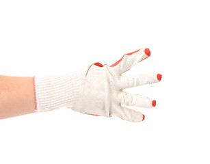 Hand in glove showing four.