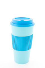 Blue plastic coffee mug isolated on white background