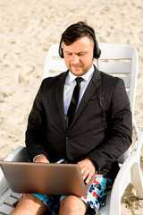 Businessman on the beach
