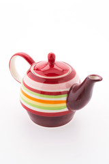 Colorful tea pot isolated on white background