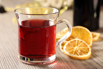 Red hot drink and orange sliced - 71123894