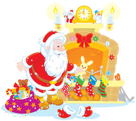 Obraz na płótnie Canvas Santa Claus putting his gifts into decorated socks