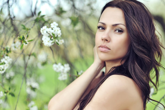 Portrait of a beautiful young brunette woman outdoor