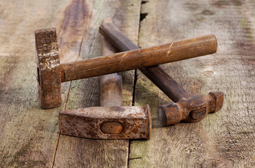 old vintage building tools on a wooden background