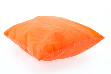 Orange pillow isolated on white background