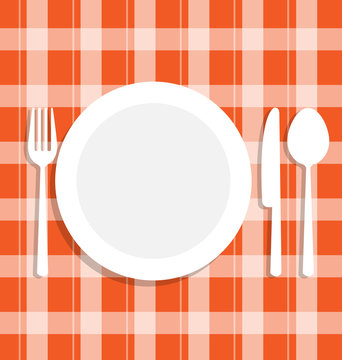 Cutlery dish on orange tablecloth