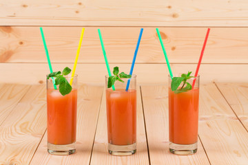 Grapefruit juice on table.