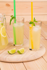 Lemonade fresh on wooden board.