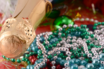 Beautiful ornaments, champagne, pearl and balls as a New Year