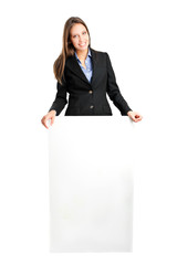 Businesswoman holding a blank card