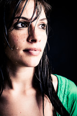 Wet woman on dark