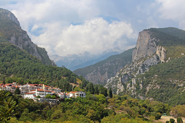 Fototapeta na wymiar Mount Olympus in Greece. On the foreground - small town