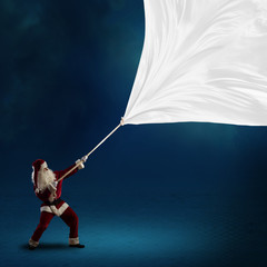 Santa Claus pulls the banner