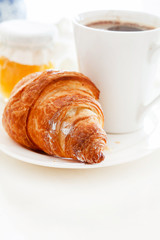 Croissant and a cup of espresso