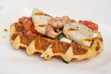 Belgian waffle with shrimps and grilled fish