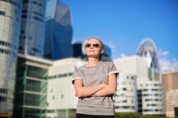 Confident woman in business district of Paris