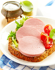 sandwich with sliced sausage