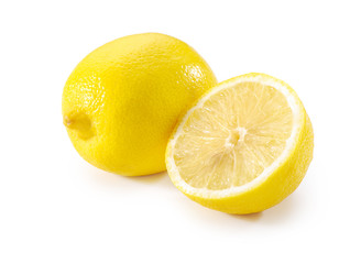 whole lemon and half close-up on white background