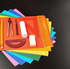 Stationery over the colorful sheets