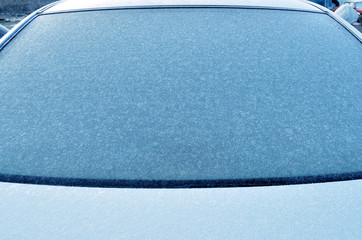 frozen car windshield in winter